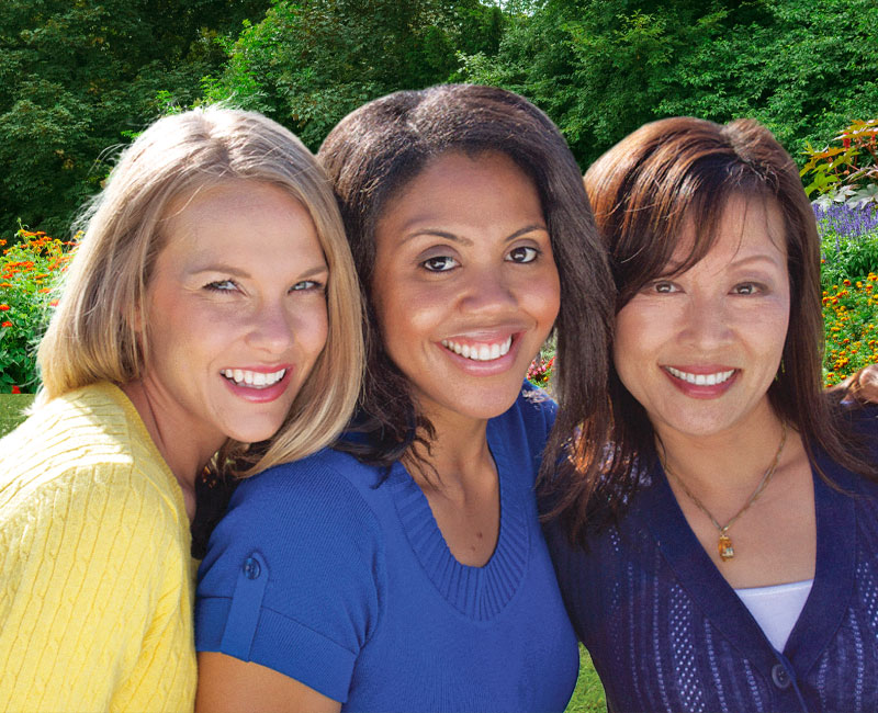 three smiling ladies